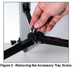 Step 3: Attach the white plastic accessory tray in place uisng the accessory