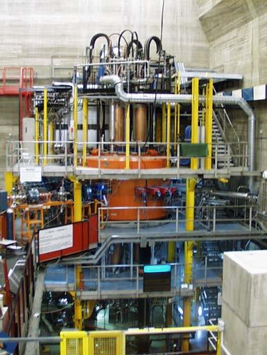 Strong focusing three-sector machine Kb = 800 and Kf = 200 Superconducting Nb-Ti coils cooled down to 4.2 K in an LHe bath.