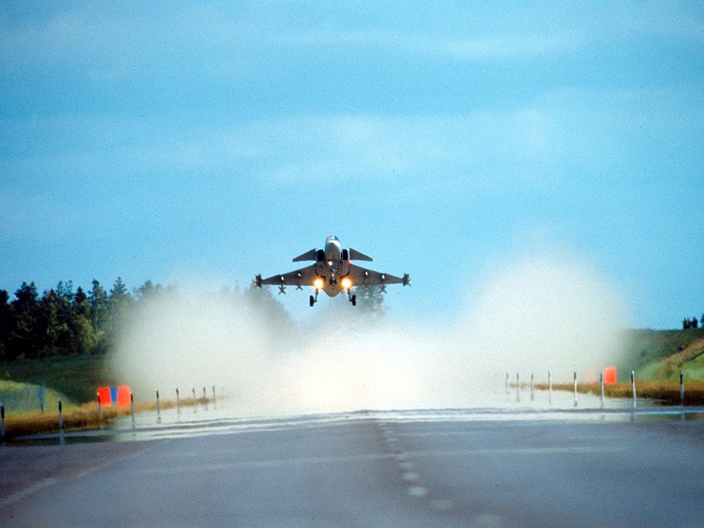 This picture shows a SAAB JAS39 Gripen landing on a