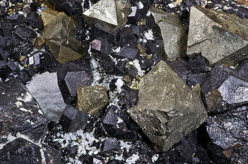 Natural ores called magnetites contain Iron and are magnetic These are also called lodestones and are what