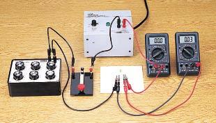 should be connected in series with the power supply and the resistor. The voltage meter should be connected in parallel with the power supply.