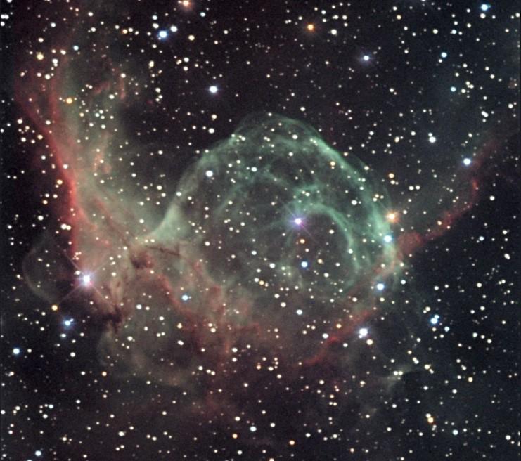 Thor s Helmet (NGC 2359), a bubble-like nebula blown from the hot Wolf-Rayet star in its centre.