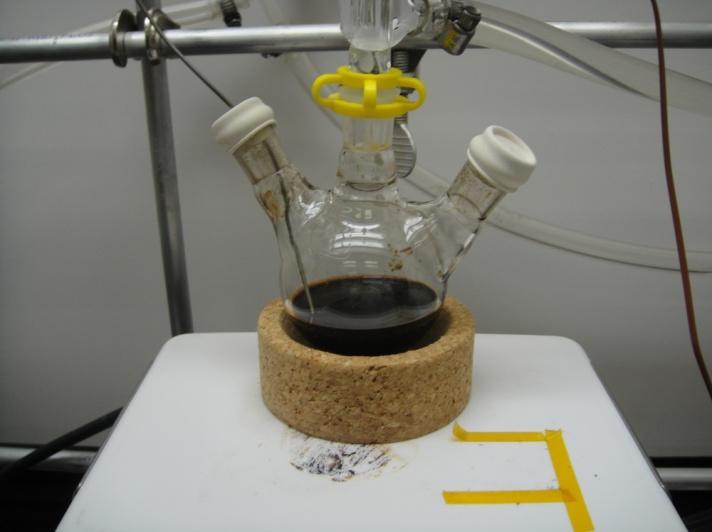 Synthesis of colloidal nanocrystals Typical three-headed flask set up. The middle head is connected to the Schlenk line s glass manifold.
