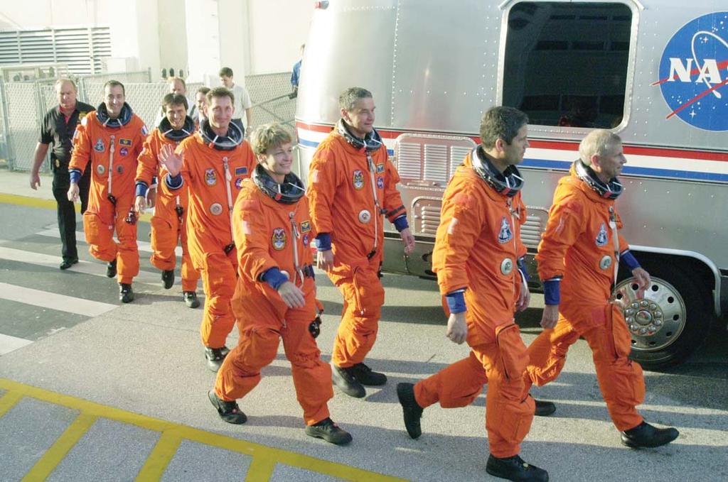 Wearing Space Suits for Protection Space suits are like mini spacecraft, designed to protect astronauts from exposure to space. For example, the normal human body temperature is about 37 C.