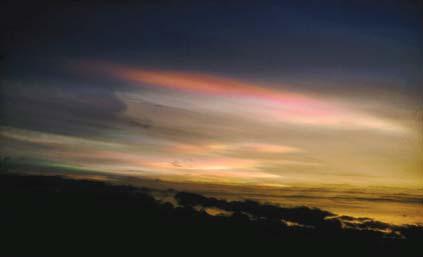 The clouds in this photograph are nacreous clouds.