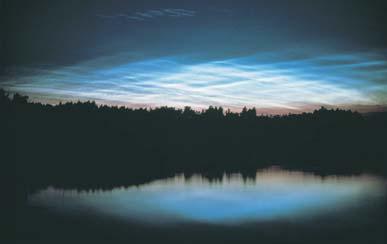 The wavy clouds in this photograph are noctilucent clouds.