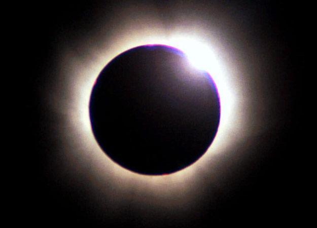 A solar eclipse happens when the moon passes between the Earth and the Sun. Solar eclipses occur only during new moons.