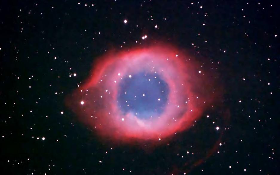 The camera is a Canon 20D that has had its infrared filter removed so that the deep reds from glowing hydrogen gas clouds in space can come through.
