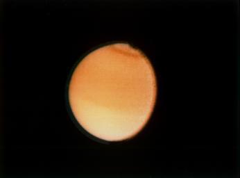 Saturn : Titan Titan is Saturn s largest moon. The photograph was taken by Voyager 2 in 1980.