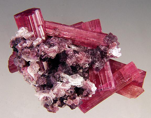 cools to a solid state, they form crystals Size of