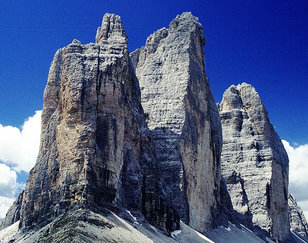 The Dolomites of Italy Tre Cime (Three Peaks) di Lavaredo Dolomiti region of Belluno and Bolzano, Italy Dolomites as rocks were first investigated and described in northern