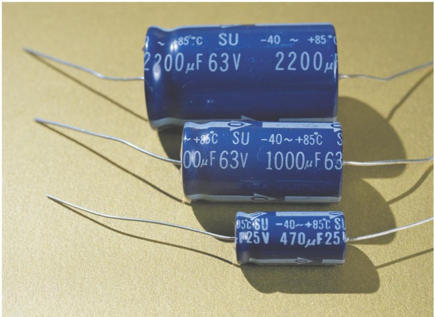 The unit of capacitance, the farad, is very large Commercial capacitors for home electronics are often cylindrical, from the size