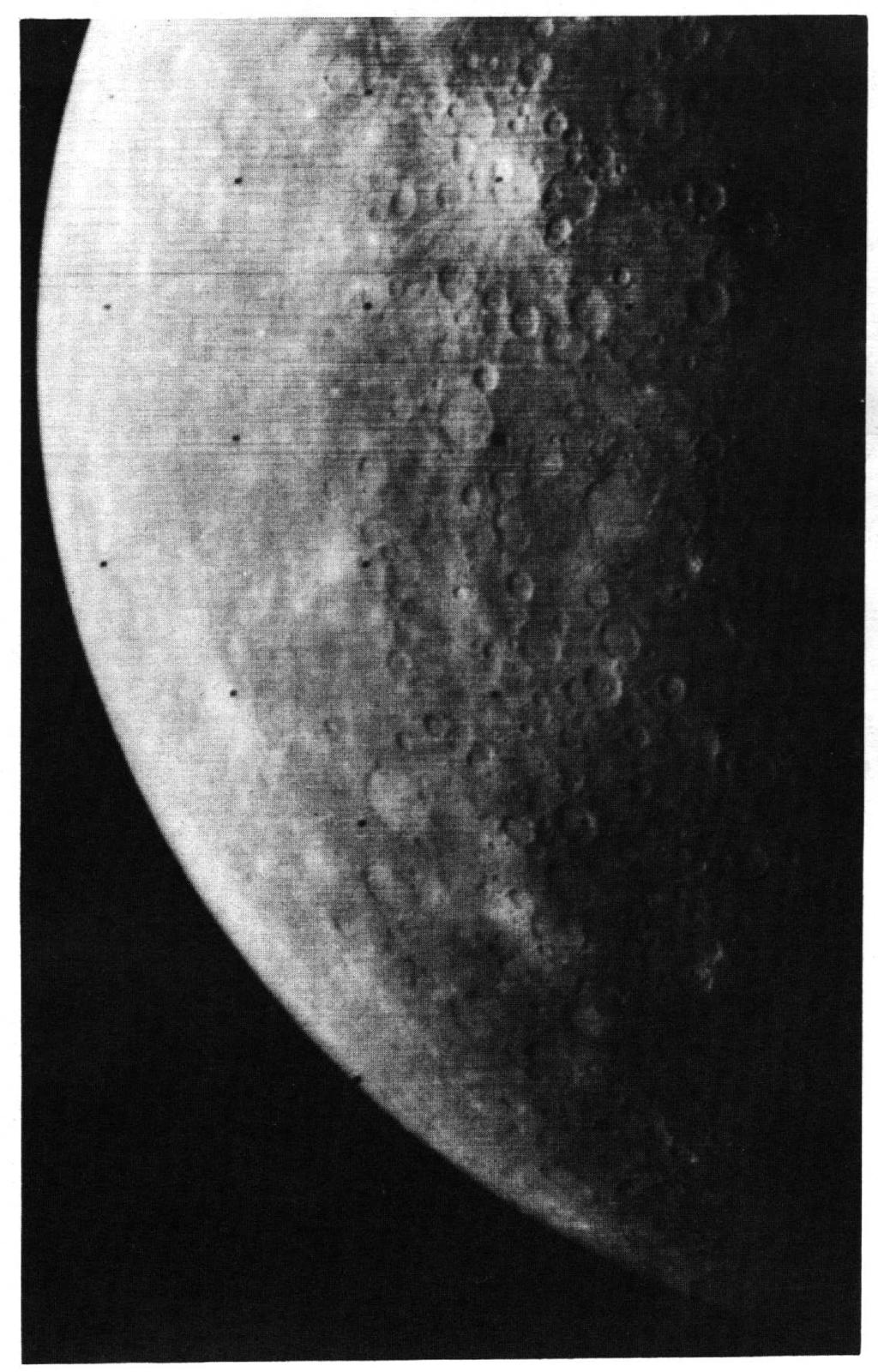 BOTTOM An abundance of craters near the evening terminator can be seen in this picture of Mercury taken by one of Mariner 10's two television cameras.