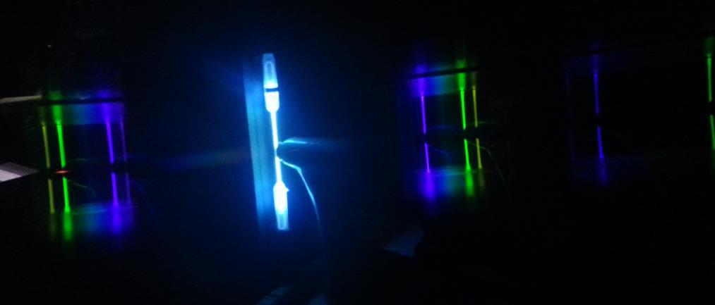 Figure 1-Hydrogen Light Source as Seen Through a Diffraction Grating* *Figure 1 was taken by placing the diffraction grating against the camera lens and aiming it towards the hydrogen light source.