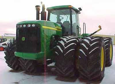 Low Pressure Applications A tractor moving on soft ground has wide tires to