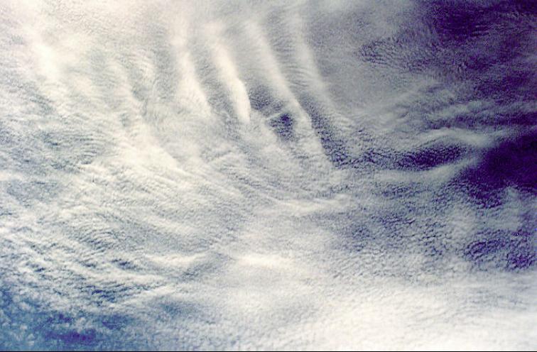 Cirrus Clouds - High Clouds "Feathers" or "Wisps" or small "Puffs" almost always High clouds Usually Ice crystals