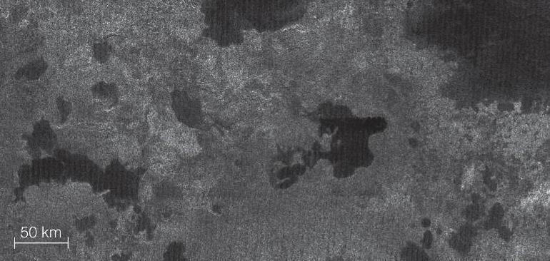 Titan s Lakes Radar imaging of Titan s surface reveals
