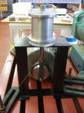 The MR damper was filling with MRF-1-ED. Figure 16 damper connected to DC machine. Stationary tests were conducted to measure the current necessary to stop the piston movements for an applied force.