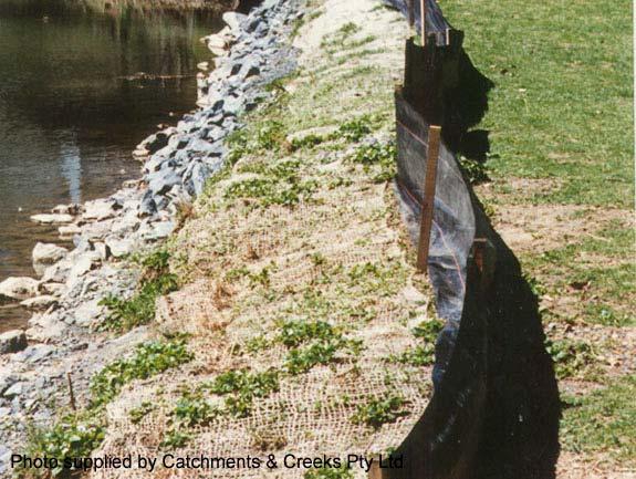 Photo 1 Erosion control blankets installed during channel revegetation Photo 2 Jute mesh scour protection on the upper bank and lower rock protection Disturbed instream surfaces need to be