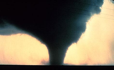 Tornados A tornado is "a violently rotating column of air in contact with the ground and coming from a thunderstorm." Tornadoes are the most violent storms on Earth.