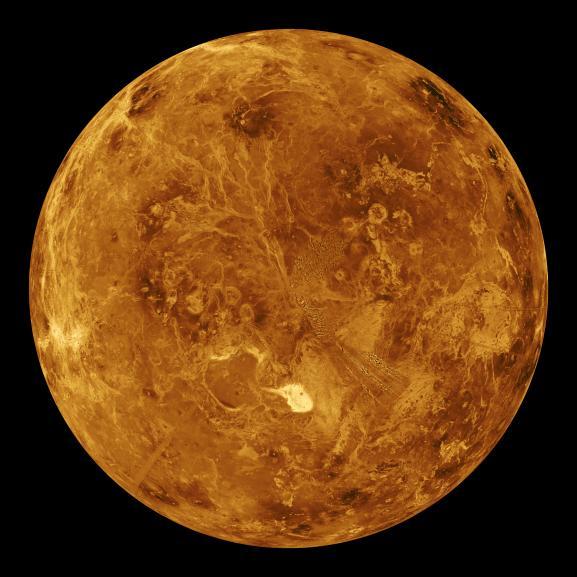 Venus At first glance, if Earth had a twin, it would be Venus. The two planets are similar in size, mass, composition, and distance from the Sun. But there the similarities end. Venus has no ocean.