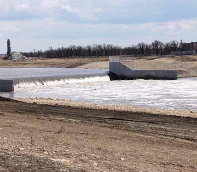 When the floodway gates are raised, the water level south of the floodway inlet is restored to its natural level which, in turn, allows more water to spill into the floodway.