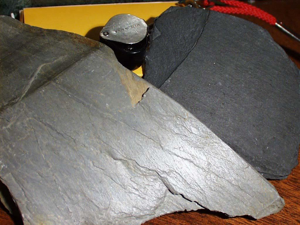 Slate: Metamorphic Rocks Foliated fine grained rock with parallel cleavage, defined by parallel growth of micas, due to regional pressure