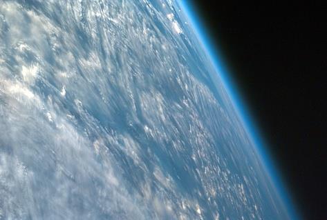 6,200 miles 430 miles Earth: Atmosphere Earth s Atmosphere extends to 6,200 miles above sea level to a layer called the exosphere.