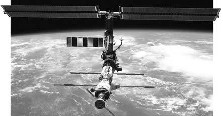 The International Space Station In 2000, the first crew boarded the International Space Station, or ISS, the newest and largest thing in space as long as two football fields!