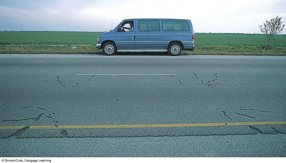 The four marks on the road surface represent areas where lightning, after striking a car traveling along south Florida s Sunshine State Parkway, entered the roadway through the tires.