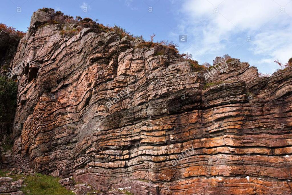 The most noticeable feature of sedimentary rock is its layers, or strata.