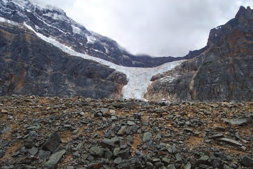 7 2 Cold Environments 2 (a) Figure 2 is a photograph showing the area around a glacier in the Canadian Rockies.