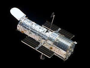11 OR Sec 4 Physics Set C Paper 2............ [3] The Hubble Space Telescope (HST) in Fig. 11.