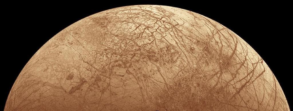 32 Europa and Tidal Heating Europa also has a density close to 3.0 g/cc. The outer layer of ice is the top of a true frozen-over ocean about 100 kilometers deep.