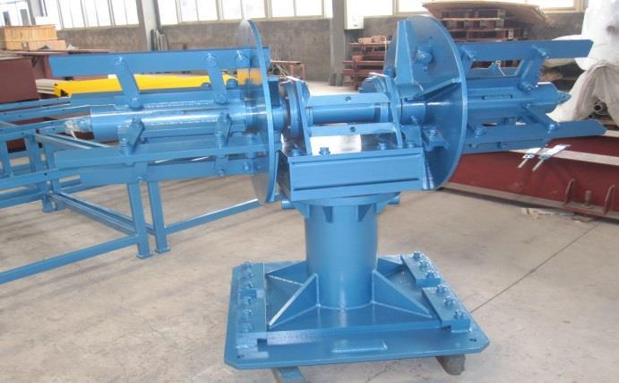 Cantilevered Dual Headed 6,000 lb Decoiler Includes mandrel and stand Can accommodate 22 coil Mandrel expands