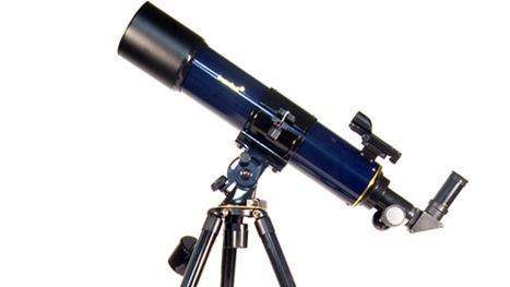 2. While holding the telescope with one hand, loosen the R.A. and Dec. lock knobs with the other. Rotate the telescope until the counterweight is horizontal to the ground 3. Tighten the Dec.
