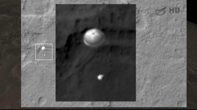 9 NASA HiRISE spies curiosity As the Curiosity rover was landing on Mars to take self portraits and do science, something really cool happened.