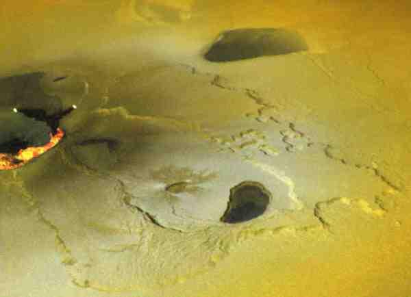 A Recent Eruption on Io Recent eruption (Nov. 1999) Active eruption (Feb. 2000) 250 km 35 The Effects of Volcanism on Io!