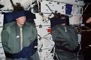 How does the space craft provide living, sleeping? Sleeping is challenging in microgravity.