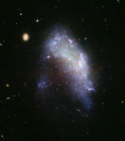 3. Irregular Galaxies No particular shape Usually smaller and fainter