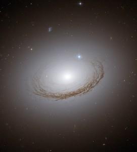 It has a prominent dust ring and relatively few globular star clusters. It has characteristics of both a spiral galaxy and an elliptical galaxy.