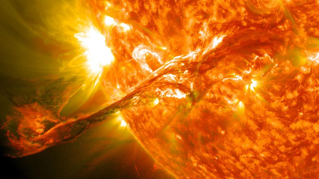 Solar Flare Video The magnetic field lines near sunspots often tangle, cross, and reorganize. This can cause a sudden explosion of energy called a solar flare.