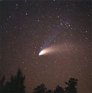 Comets A comet is a small, icy Solar System body that, when passing close to the Sun, warms and begins to release