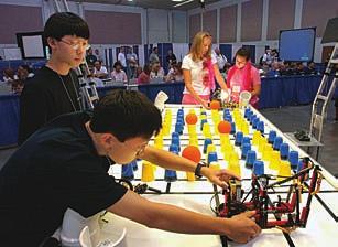 E XAMPLE 6 Use a quadratic inequalit as a model ROBOTICS The number T of teams that have participated in a robot-building competition for high school students can be modeled b T() 5 7.5 2 2 6.4 35.