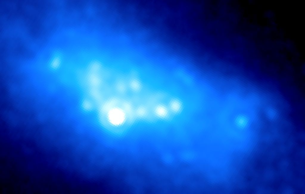 8 microns) I arcsec (44 pc) Compact (< 24 pc x 9 pc) non-thermal (synchrotron) radio emission (Johnson & Kobulnicky 2003) Radio source is not associated with a star cluster even in deep near-ir