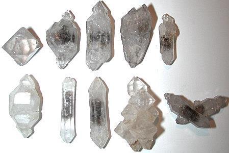 Each of these quartz crystals may be described in terms of a prism (parallel-sided column) which terminates in a dipyramid (comes to
