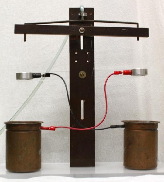 Figure 4: The Kelvin Water Dropper 11. Warning: The Wimshurst machine is a powerful electrostatic generator that can create a 3 spark between its electrodes.