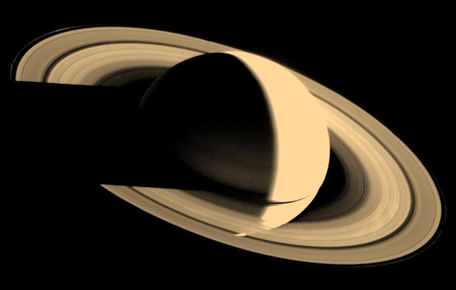 14.9 Extra Credit (10 points) Consider the image of a crescent Saturn below, taken by the Voyager 1 spacecraft on November 16, 1980. Remember that Saturn is about 9.5 AU from the Sun.