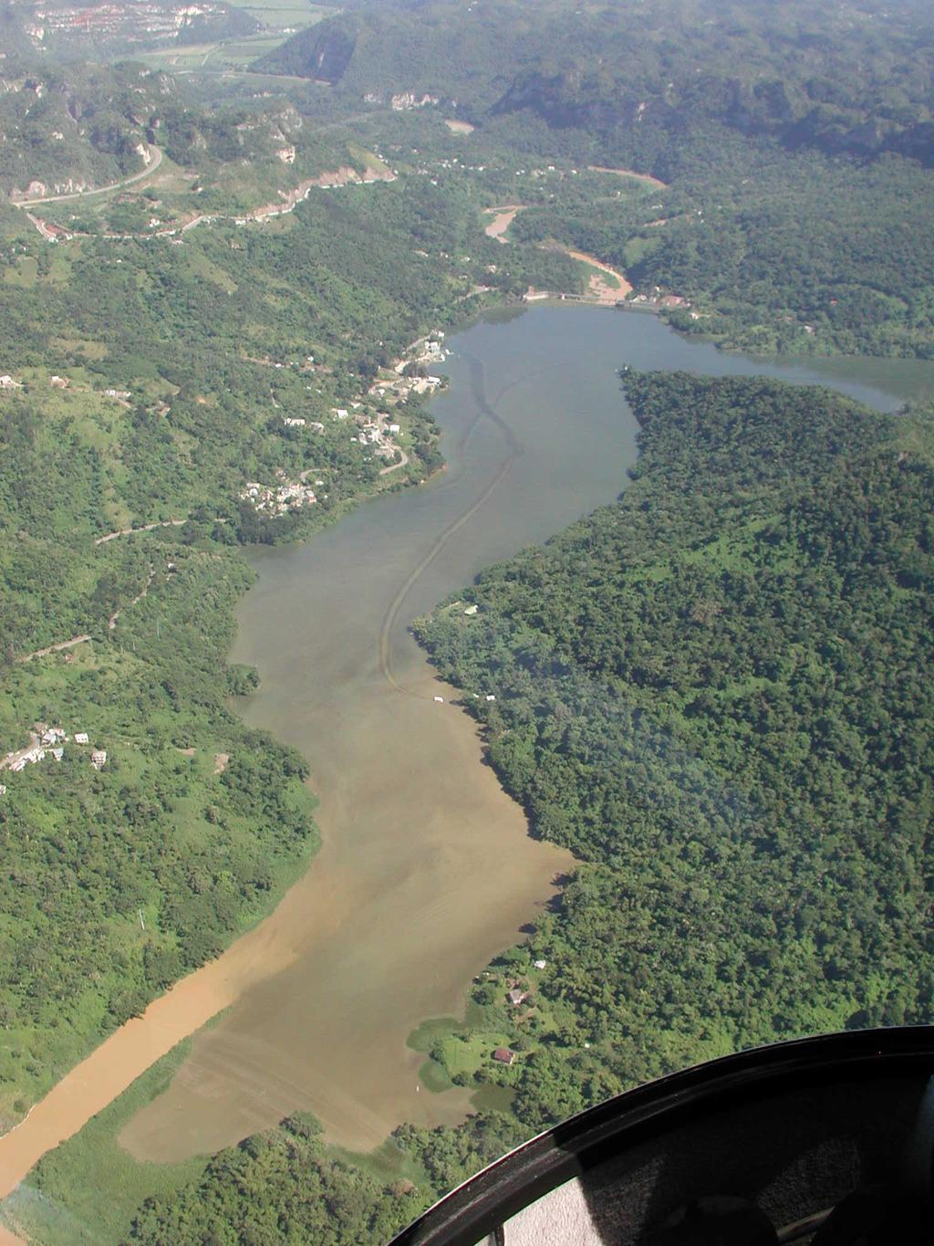 Turbid density current running through Dos Bocas reservoir, Puerto Rico Turbid water exiting turbines