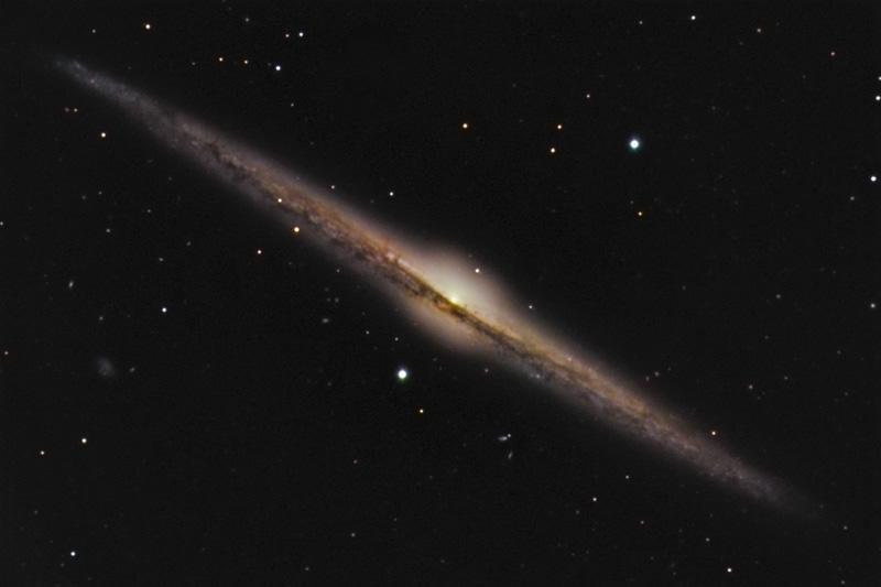 Problem 4 The image below is of the galaxy NGC 4565. Assume that this is a typical spiral galaxy seen nearly edge on. Credit: Russell Croman a.